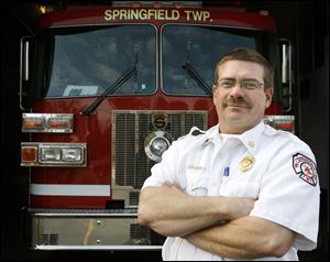 Fire Chief Barry Cousino says the plan would mean that dispatchers' efforts would not be diverted by police calls.