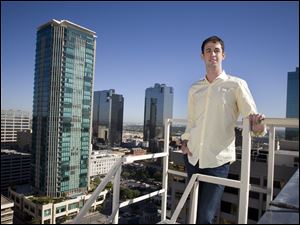 Developer Adam Blake stands atop the Electric Services building in Fort Worth. Mr. Blake's company, Atlas Properties, was on the latest Inc. 500 list of fastest-growing private U.S. companies.