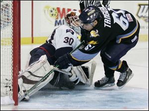 Maxime Tanguay can't get the puck past South Carolina goalie Braden Holtby during the shootout. The Walleye held a 4-1 lead but couldn't hang on in the third period.