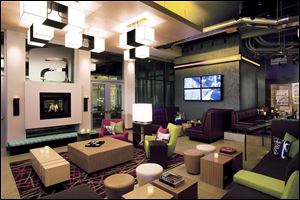 The Aloft Lexington hotel in Lexington, Mass., offers fashionable decor at a cheaper price - $119 per night compared with the $399 to $639 demanded at W Hotels, Aloft's upscale sister hotel.