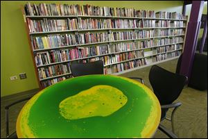 A lava table has been placed in the teen section of the Reynolds Corners Branch Library on Dorr Street.
<br>
<img src=http://www.toledoblade.com/assets/jpg/TO66067417.JPG> <b><font color=red>VIEW:</b></font color=red> <a href=