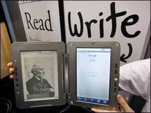 An electronic reader from EnTourage is displayed at the International Consumer Electronics Show in Las Vegas. The popularity of the devices has been growing steadily.