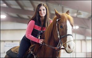 Amanda Thompson founded Healing of Veterans through Equine Assisted Services to help veterans by working with horses.