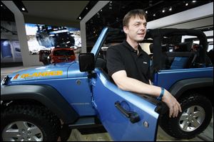 Jeep brand CEO Michael Manley, shown in a Wrangler Islander, says there are no plans to offer the Wrangler with a diesel engine in North America. But he added he has learned 'to never say never.'