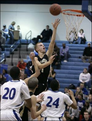 Perrysburg's Charlie Hughes scores over Springfield's Chester McFadden (20) and Leroy Alexander. The Blue Devils were looking for the upset, but the Yellow Jackets stayed undefeated in the NLL.
<br>
<img src=http://www.toledoblade.com/graphics/icons/photo.gif> <font color=red><b>VIEW</font color=red></b>: <a href=