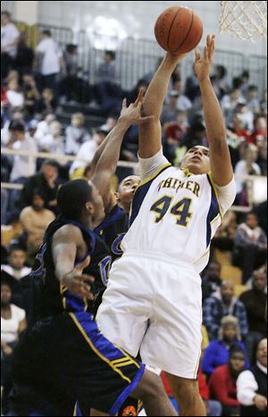 Whitmer's Chris Wormley takes a shot over Libbey's Lonacy Utley. The Panthers needed the win to stay alive in the City race.
<br>
<img src=http://www.toledoblade.com/graphics/icons/photo.gif> <font color=red><b>VIEW</font color=red></b>: <a href=