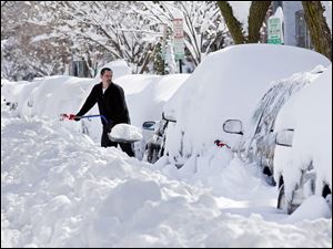 Mark Jordan cuts through the drifts on Capitol Hill in Washington after the historic snowfall.