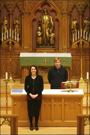 The Rev. Lars Olson, right, and the Rev. Katherine Olson, left, husband and wife Lutheran ministers, are the new pastors of St. Paul Evangelical Lutheran in American Church downtown.