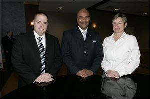 From left, Sean Heaberlin, Terrence Thomas, and Jo Ramlow at the United Way Annual Meeting and Awards Dinner.
<br>
<img src=http://www.toledoblade.com/graphics/icons/photo.gif> <font color=red><b>VIEW</font color=red></b>: <a href=