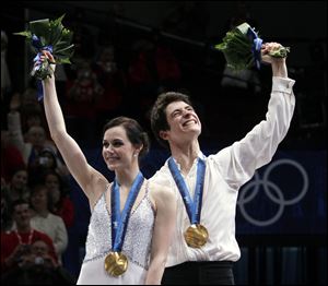 Tessa Virtue and Scott Moir of Canada won North America's first gold medal in ice dancing Monday night. 