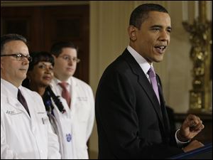 President Obama, accompanied by health-care professionals, declared during a speech in the East Room that there is no reason 'for those of us who were sent here to lead to just walk away.'