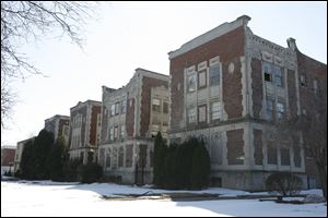 The two buildings on Collingwood Boulevard that date to 1890 have experienced neglect in recent years and are crumbling.