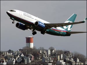 An AirTran jet takes to the skies at Boston's Logan International. The airline set prices on some flights as low as $44.