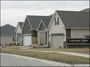 BIZ build14p  3/11/2010  The Blade/Dave Zapotosky Caption:  Homes already completed in the new Lakeside subdivision off of Monclova Road near Strayer Road in Monclova Township, Thursday, March 11, 2010. There is only home currently under construction there.