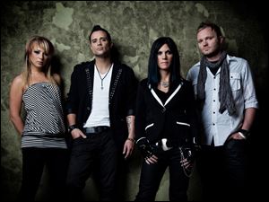 Skillet, performing in Toledo Sunday with Toby Mac, features, from left, Jen Ledger, John Cooper, Korey Cooper, and Ben Kasica.