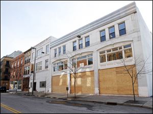 Slug: BIZ BUILD21p  Date:  03162010     Andy Morrison       Location: Toledo Caption: The new home of Thomas Porter Architect at 8 North St. Clair Street, Tuesday, 03162010. Summary.