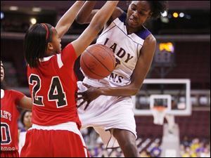 Waite's Natasha Howard loses the ball against Canton McKinley's Laneisha Lennon in Saturday night's Division I state girls basketball championship game at Value City Arena. The Indians finish 24-3.
<br>
<img src=http://www.toledoblade.com/graphics/icons/photo.gif> <font color=red><b>PHOTO GALLERY</b></font>: <a href="/apps/pbcs.dll/gallery?Avis=TO&Dato=20100321&Kategori=SPORTS12&Lopenr=321009999&Ref=PH"_blank"> <b> Waite - Canton McKinley girls state final</b></a> 