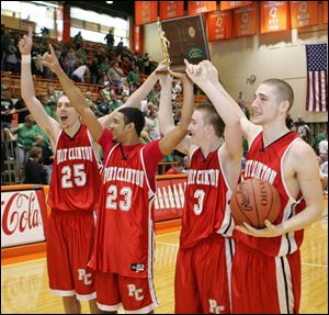 Port Clinton seniors Ryan Hicks, left, Allen Tigner, Cory Brown, and Josh Francis hoist the Division II regional championship trophy after the Redskins beat Celina at BGSU's Anderson Arena. 
<br>
<img src=http://www.toledoblade.com/graphics/icons/photo.gif> <font color=red><b>PHOTO GALLERY</b></font>: <a href=