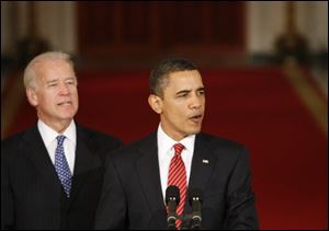 ‘I know this wasn't an easy vote. … But it was the right vote,' said President Obama, flanked by Vice President Joe Biden.