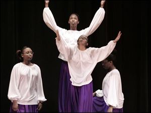 CTY notredame24p   03/23/2010       The Blade/Lori King  Notre Dame students from left: Tristan Burt, Chahdael Smith, back, Semone Wilbert and Israelle Nelson, performs a praise dance during the Notre Dame Academy multicultural assembly at the Toledo, OH school.