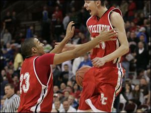 Port Clinton's Allen Tigner, left, celebrates with Ryan Hicks after Tigner's short jumper gave the Redskins a 51-50 win last night. Port Clinton will play for its first state title tomorrow.
<br>
<img src=http://www.toledoblade.com/graphics/icons/photo.gif> <font color=red><b>PHOTO GALLERY</b></font>: <a href=" /apps/pbcs.dll/gallery?Avis=TO&Dato=20100326&Kategori=SPORTS12&Lopenr=326009999&Ref=PH"_blank"> <b> Boys basketball, Port Clinton vs. Zanesville: </b></a> March 25, 2010