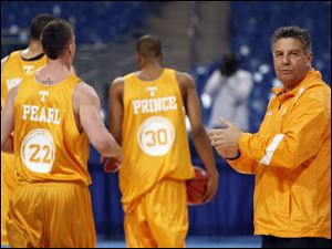 Coach Bruce Pearl and the Vols battled back from the arrest and suspension of key players over drugs and weapons charges.