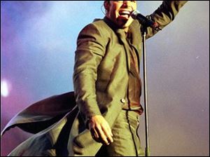 In this June 26, 1998 file photo, Puerto Rican pop star Ricky Martin performs at the Presidente Latin Music Festival held in national stadium in, Santo Domingo, Dominican Republic.