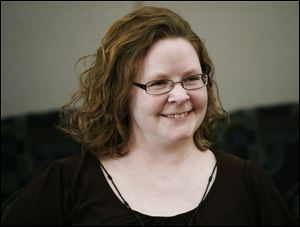 Julie Lyle, 31, of Ishpeming, Mich., wants to boost dog adoption rates to at least 80 percent.