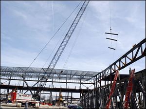 Construction crews work on what will be the Stroh Center on the Bowling Green State University campus. 