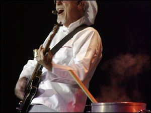 Bill 'Sauce Boss' Wharton is known for cooking on stage as he plays. He started the routine to promote his hot sauce in 1990.