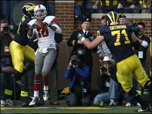 Ohio State's Devon Torrence, making an interception against Michigan, says he understands the position better this spring.