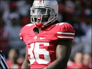 Ohio State linebacker Brian Rolle reacts during a game against Wisconsin in this October 10, 2009 file photo.