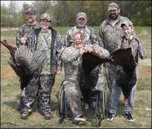Successful Wheelin' Sportsmen turkey hunters and their guides include, from left, Ben and Crystal Hammond, Gus Franks and guide Jim Steinwand, and guide Rob Fleitz and young hunter Nick Hunt. 