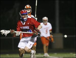 St. Francis' Scott Loy looks for a pass in the Knights' victory over Southview. Loy had four goals in the win.