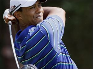 Tiger Woods struggled at times yesterday, but he still managed a 2-under 70, which was nine shots better than his last round.