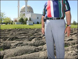 Mohamed Youssef is helping start the first garden at the Islamic Center of Greater Toledo. 'If we do this, we can give the food bank the vegetables and produce from our land.'