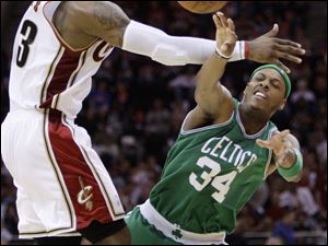 Cleveland's LeBron James tries to block a pass by Boston's Paul Pierce. James scored 38 points Friday night in Game 3.