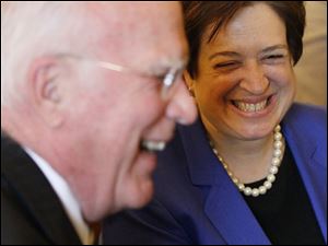 Vermont Sen. Patrick Leahy and Elena Kagan share a laugh yesterday as Ms. Kagan makes the rounds on Capitol Hill.