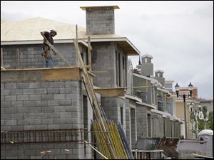 Construction of houses such as these about 10 miles northwest of Fort Lauderdale, Fla., pushed activity to a seasonally adjusted annual rate of 672,000 units, the highest since October, 2008.
