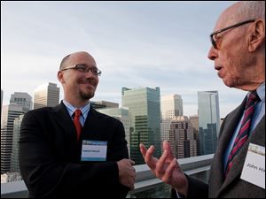 Gabriel Metcalf, left, says his hometown's city-county government has its problems but overall is effective. The executive director of San Francisco Planning and Urban Research Association met recently with a predecessor, founding Executive Director John Hirten. 