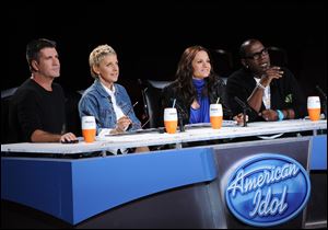 ‘American Idol' judges, from left, Simon Cowell, Ellen DeGeneres, Kara DioGuardi, and Randy Jackson. Cowell exits the show after this season, creating an opportunity — or more trouble — for ‘Idol.'