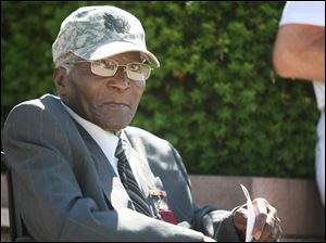 Johnnie Harris, 85, a World War II veteran, wears the medals he earned during his service in the Army.
<br>
<img src=http://www.toledoblade.com/graphics/icons/photo.gif> <font color=red><b>PHOTO GALLERY</b></font>: <a href=" /apps/pbcs.dll/gallery?Avis=TO&Dato=20100530&Kategori=NEWS16&Lopenr=530009998&Ref=PH"_blank"> <b> Memorial Day parade: </b></a> May 29, 2010