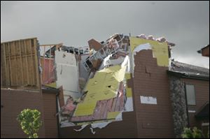 Guests were evacuated from the Dundee Holiday Inn Express when the roof of Splash Universe was ripped off by a tornado.
