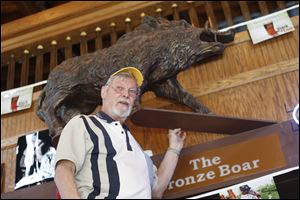 John Orr, owner of the Bronze Boar on South Huron Street downtown, is missing his 150-pound statue. The police say they have no leads but believe that pranksters were responsible.