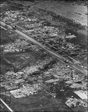 The Palm Sunday tornado of April 11, 1965, swept across 10 miles of West Toledo and Point Place, leaving 310 families homeless. 