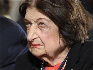 FILE - In this May 27, 2010 file photo, Helen Thomas listens to President Barack Obama during a news conference in the East Room of the White House in Washington. Controversial remarks about Israel by veteran White House reporter Helen Thomas drew sharp criticism from the Obama administration on Monday, as well as the cancellation of a high school graduation speech she was to deliver. White House press secretary Robert Gibbs was asked at his daily briefing with reporters about President Barack Obama's reaction to Thomas' remarks. Gibbs called them 