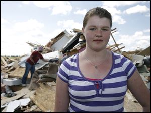 Sierra Richardson, 13, of Liberty Center was inside a house on County Road 7 when the tornado struck. No one heard a siren.