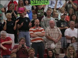 A crowd cheers for the 1483rd as they arrive at Owens' Student Health and Activities Center on the Perrysburg Township campus. More than 300 Owens students from that campus and the one in Findlay are currently serving in the military.