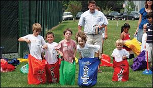 Children attend the sack races at the Carranor Hunt and Polo Club's Annual Field Day.