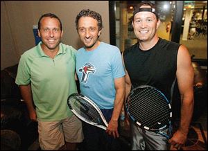 Scott Schoepf, left, Joe Pinciotti, center, and Greg Reece attend the AdClub tennis event.